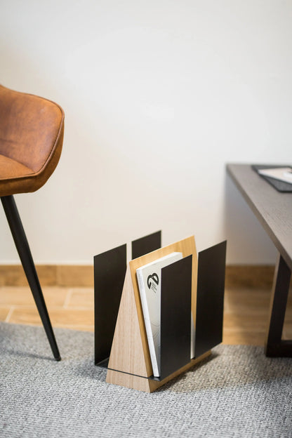 Modern magazine rack "under the protection of wings"