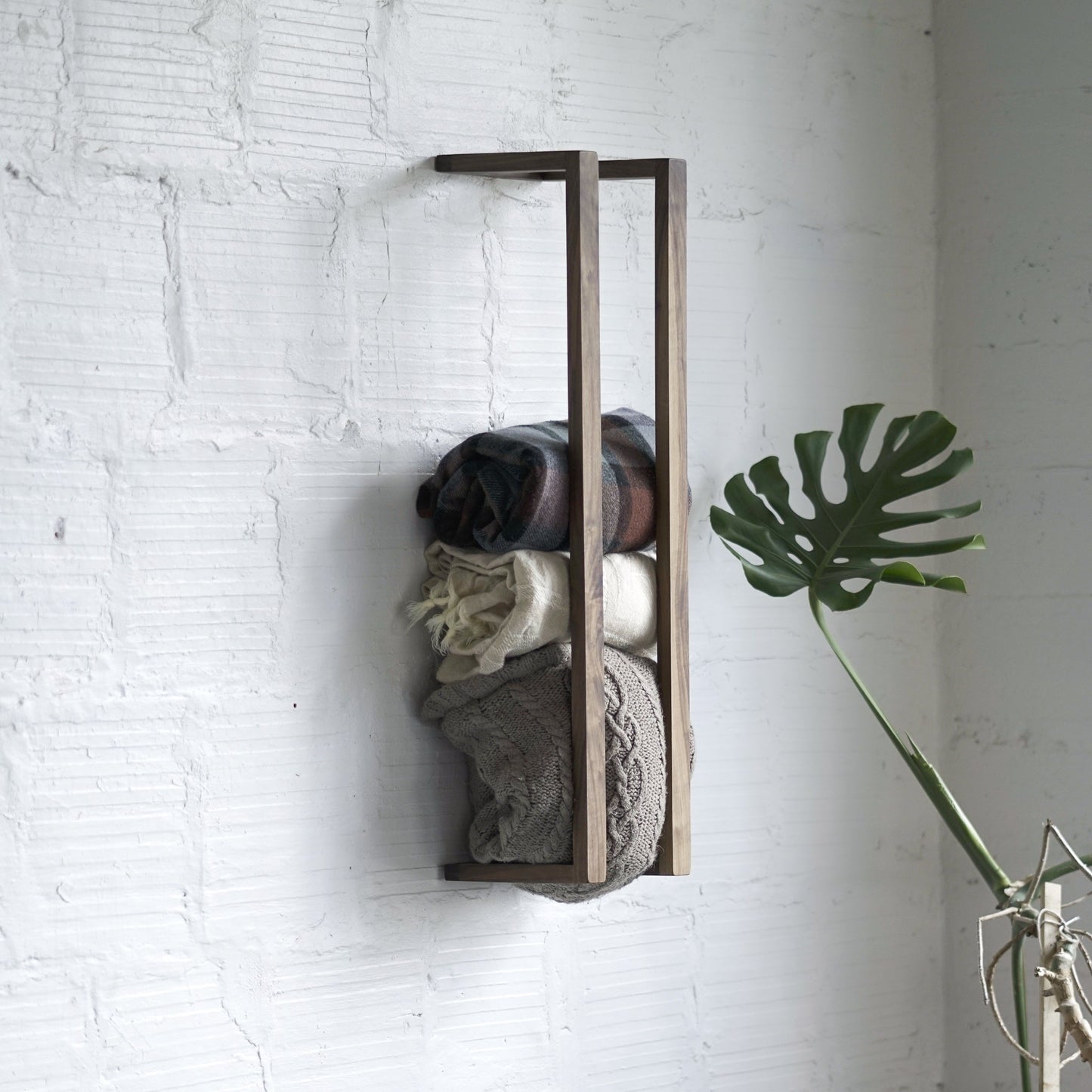 Modern and minimalist clothes rack, wall rack, organizer and towel rack