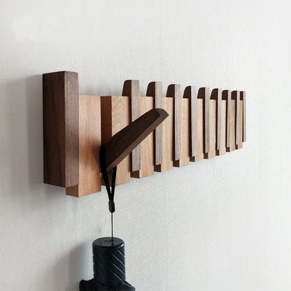 Wooden wall hanger from brown walnut wood
